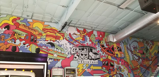 Grateful Shed logo mural wall