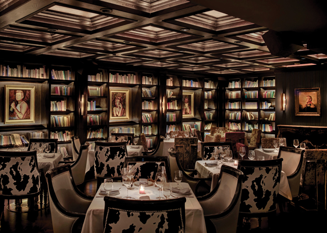 Yvonne's in Boston has a library-themed dining area with a secret bookcase that leads to a private event space. Images courtesy of Richard Cadan