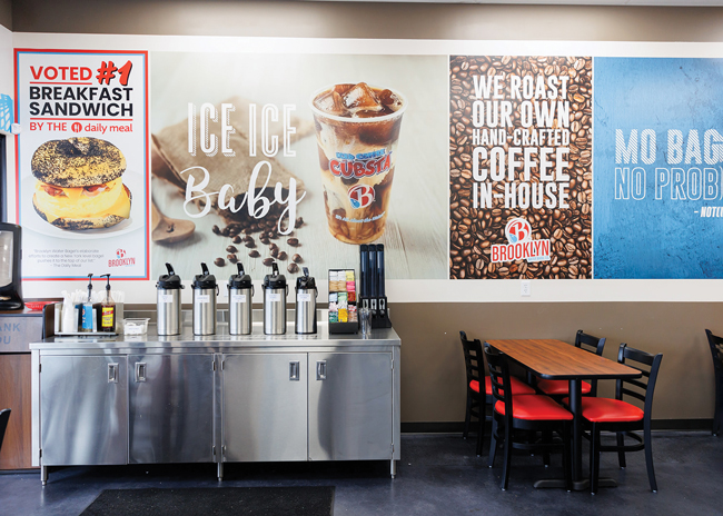 Brooklyn Water Bagel positions a coffee dressing station close to the main door so that guests can finish their drinks and quickly exit. Image courtesy of Orlando Weekly