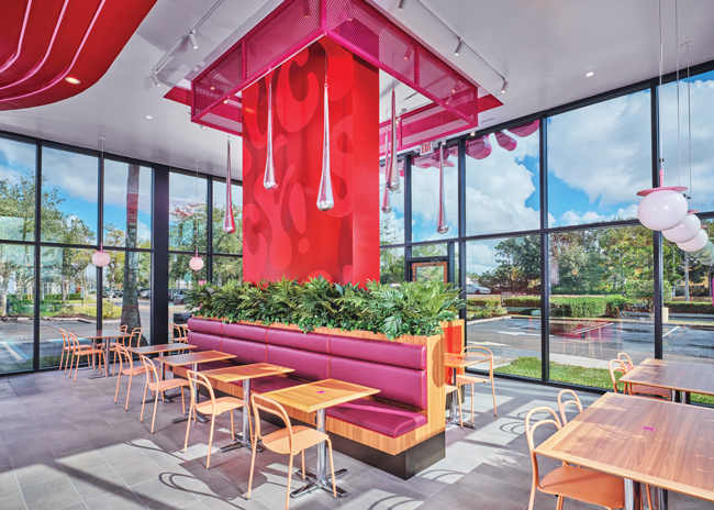 Much of Saucy’s seating is built around a large rectangular pillar in the middle of the dining area. Images courtesy of Saucy