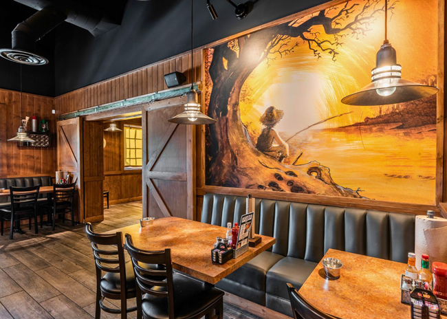 Bayou inspired murals and playful themed accents are found throughout the restaurant.