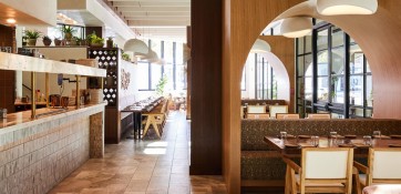 exposed kitchen   main dining room photo by andrew thomas lee